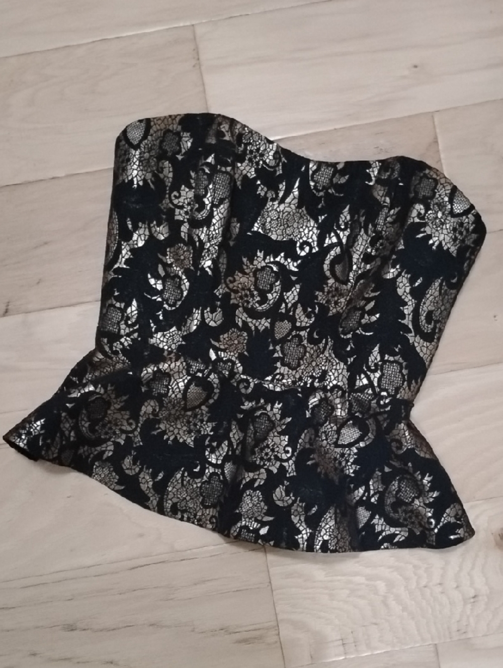 bebe Black and Gold Lace Peplum Strapless Top